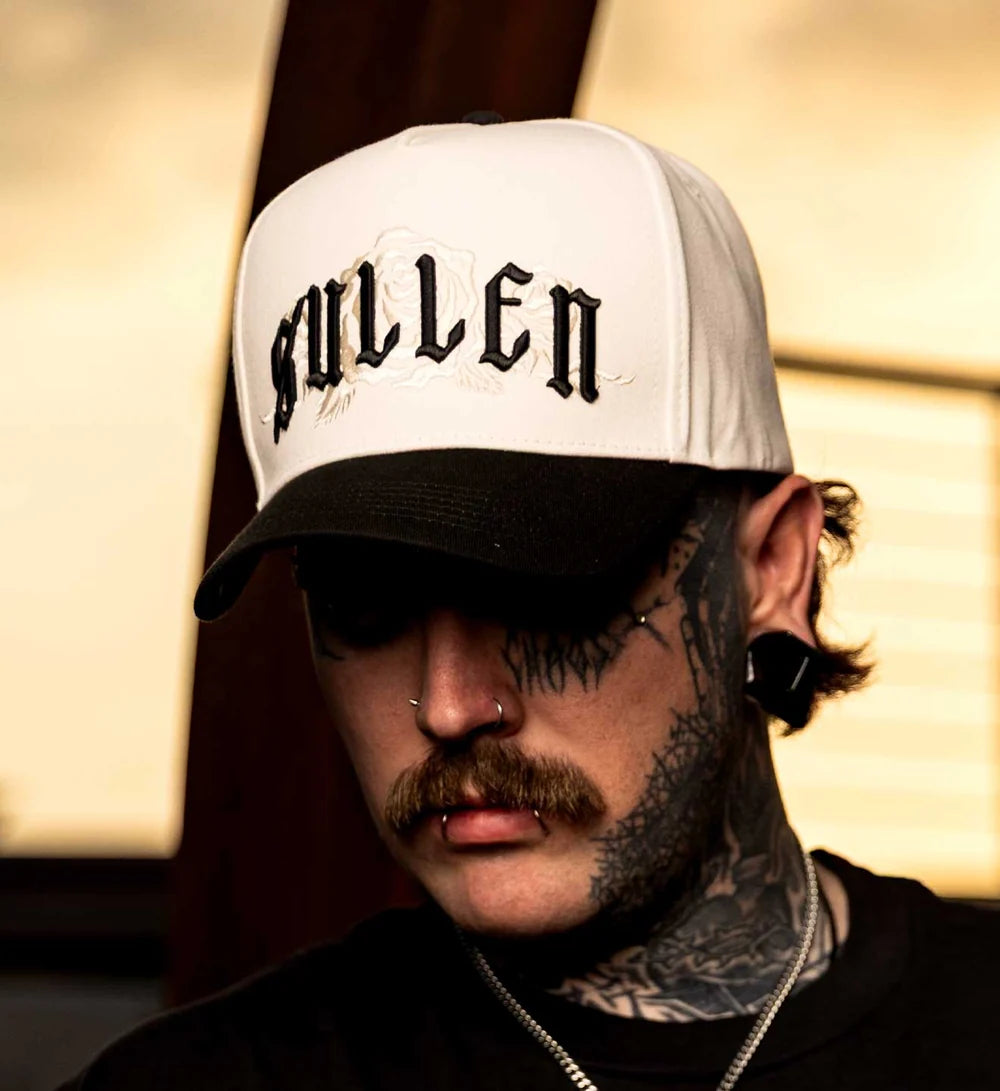 PLEASURES SNAPBACK